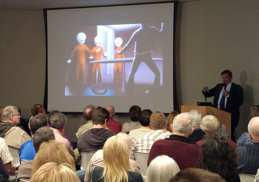 Travis Walton speaks to an audience at Mainline MUFON on May 23, 2017.