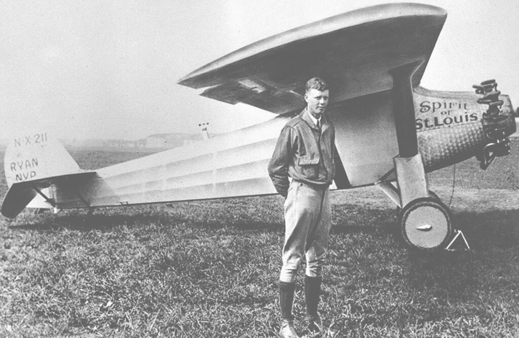 Charles Lindbergh and the Spirit of St. Louis airplane.